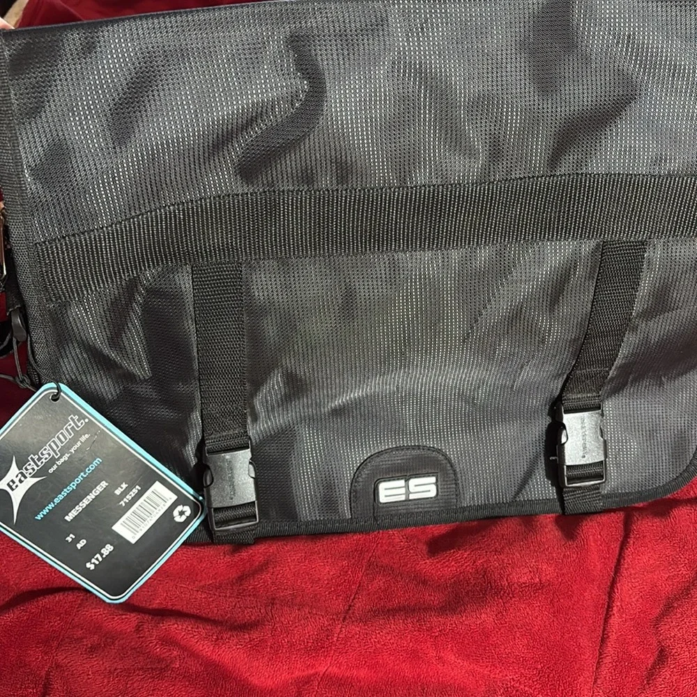 Messenger bag features laptop sleeve- multi- function pockets— Adjustable strap